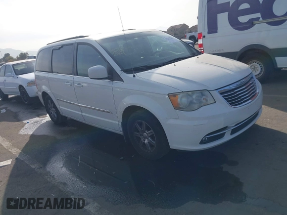 2012 Chrysler Town & Country Touring z VIN 2C4RC1BGXCR410507, wystawiony jako IAAI lot #41215704 z przebiegiem 161 501 mil mil oraz . Historia ofert i sprzedaży dostępna na DreamBid. Obrazek 1.