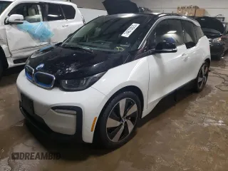 2021 BMW i3 with VIN WBY8P2C09M7J64171, listed as a Copart auction lot 74870823 with 9,815 mi miles. Bid and sale history available at carsss.com. Image 1.