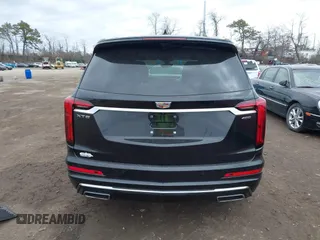 2021 Cadillac XT6 Premium Luxury with VIN 1GYKPCRSXMZ222454, listed as a IAAI auction lot 41648439 with 113,547 mi miles and . Bid and sale history available at carsss.com. Image 16.