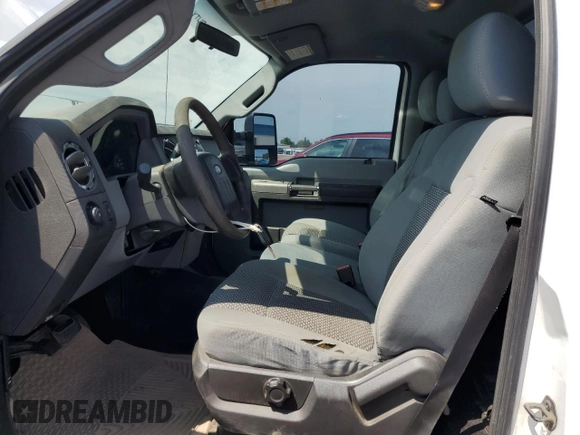 2011 Ford F-250 XL with VIN 1FTBF2B63BEB24712, listed as a Copart auction lot 65013145 with 176,681 mi miles and Salvage title. Bid and sale history available at DreamBid. Image 7.