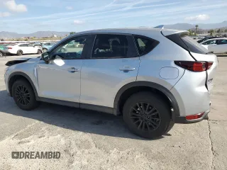 2019 Mazda CX-5 Touring with VIN JM3KFACMXK1556090, listed as a Copart auction lot 47541005 with 82,030 mi miles and Salvage Title. Bid and sale history available at carsss.com. Image 2.