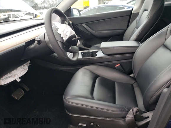 2021 Tesla Model Y Long Range with VIN 5YJYGDEE7MF160510, listed as a Copart auction lot 51098925 with 48,038 mi miles and Salvage Title. Bid and sale history available at DreamBid. Image 7.