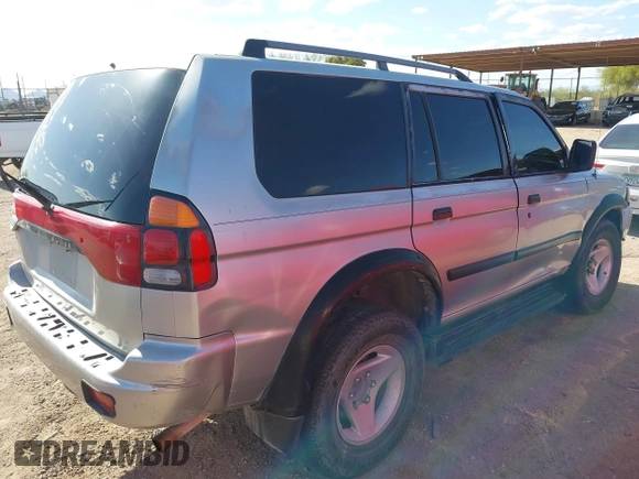 2001 Mitsubishi Montero ES z VIN JA4LS21HX1P041052, wystawiony jako IAAI lot #42084599 z przebiegiem 239 095 mil mil oraz . Historia ofert i sprzedaży dostępna na DreamBid. Obrazek 4.