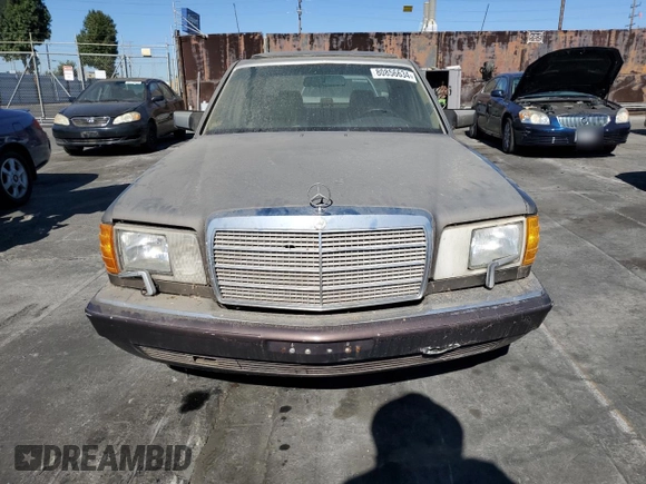 1989 Mercedes-Benz 560 with VIN WDBCA39D7KA428953, listed as a Copart auction lot 80856634 with 243,871 mi miles and Clean Title. Bid and sale history available at DreamBid. Image 5.