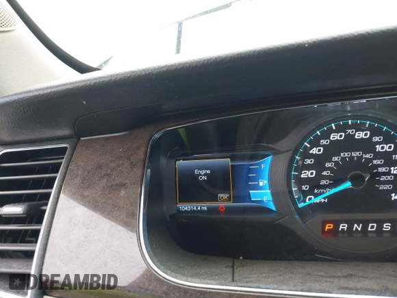 2015 Ford Taurus Limited with VIN 1FAHP2F85FG117635, listed as a IAAI auction lot 41979311 with 104,314 mi miles. Bid and sale history available at carsss.com. Image 7.