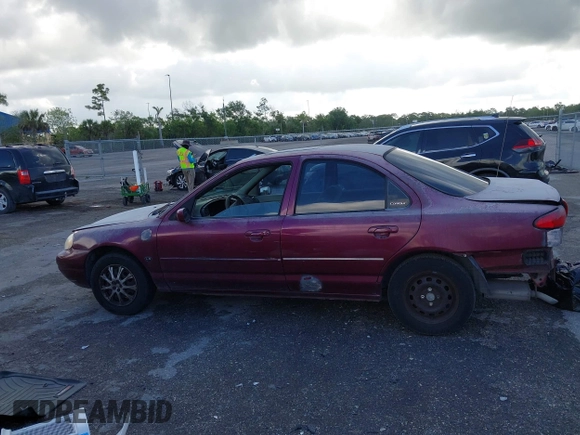 1999 Ford Contour SE z VIN 1FAFP6635XK169090, wystawiony jako IAAI lot #42198696 z przebiegiem 114 933 mil mil oraz . Historia ofert i sprzedaży dostępna na DreamBid. Obrazek 14.