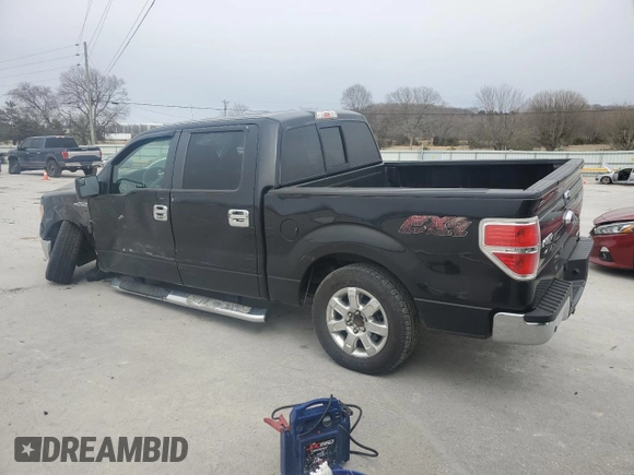 2014 Ford F-150 XL with VIN 1FTFW1CF3EKG41038, listed as a Copart auction lot 48328585 with 104,492 mi miles and Salvage Title. Bid and sale history available at carsss.com. Image 2.