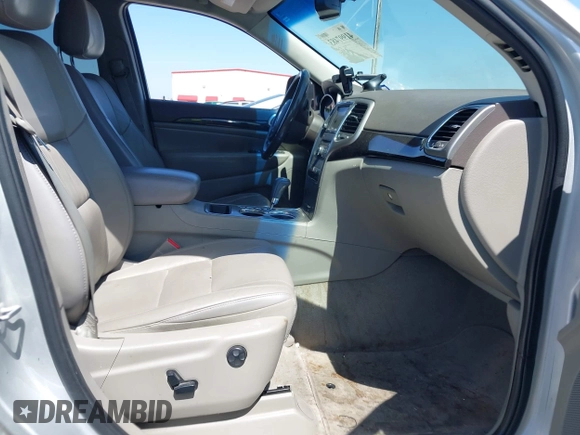 2012 Jeep Grand Cherokee Laredo with VIN 1C4RJEAG5CC112230, listed as a IAAI auction lot 41997483 with 302,923 mi miles. Bid and sale history available at carsss.com. Image 5.