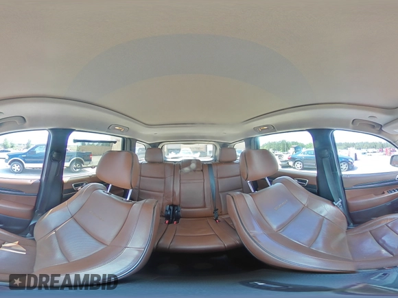 2015 Jeep Grand Cherokee Summit with VIN 1C4RJFJG6FC828922, listed as a Copart auction lot 54878415 with 125,781 mi miles and Salvage title. Bid and sale history available at DreamBid. Image 14.