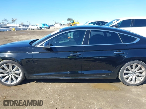 2018 Audi A5 Sportback Premium z VIN WAUANCF53JA009200, wystawiony jako IAAI lot #41725501 z przebiegiem 107 076 mil mil oraz . Historia ofert i sprzedaży dostępna na DreamBid. Obrazek 15.