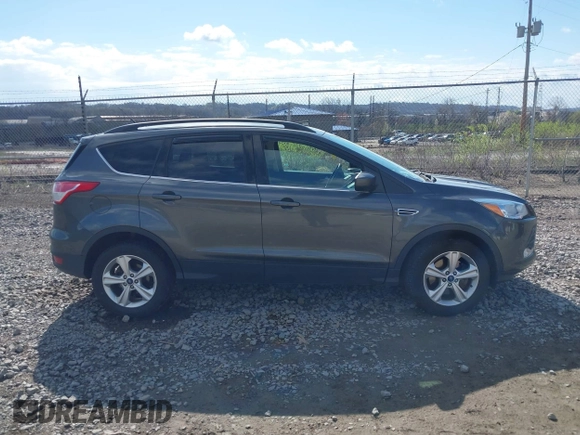 2016 Ford Escape SE with VIN 1FMCU9GX5GUA06660, listed as a IAAI auction lot 42043031 with 87,719 mi miles. Bid and sale history available at carsss.com. Image 13.