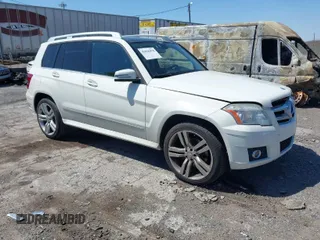 2012 Mercedes-Benz GLK GLK 350 with VIN WDCGG8HB1CF912422, listed as a IAAI auction lot 42036478 with 126,136 mi miles. Bid and sale history available at carsss.com. Image 1.
