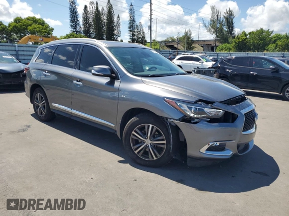 2019 Infiniti QX60 Pure with VIN 5N1DL0MN5KC560950, listed as a Copart auction lot 61051805 with 55,857 mi miles and Salvage title. Bid and sale history available at DreamBid. Image 4.