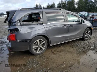 2021 Honda Odyssey Touring with VIN 5FNRL6H87MB033970, listed as a Copart auction lot 48928895 with 52,287 mi miles and Salvage Title. Bid and sale history available at carsss.com. Image 3.