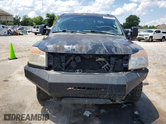 2011 Nissan Titan Pro-4X with VIN 1N6BA0EC6BN313680, listed as a Copart auction lot 60335995 with 241,301 mi miles and Salvage title. Bid and sale history available at DreamBid. Image 5.