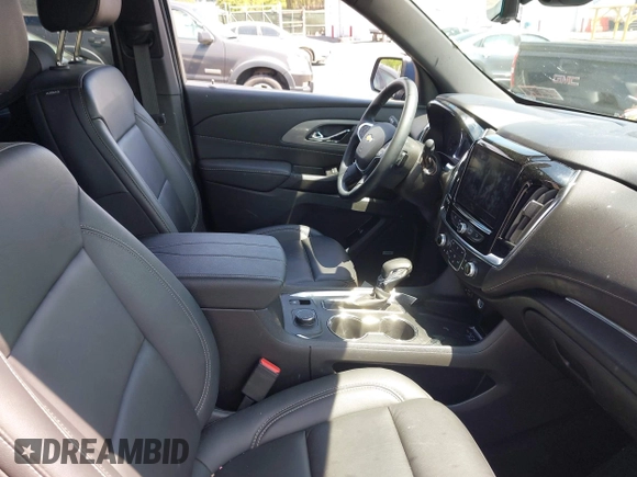 2023 Chevrolet Traverse LT z VIN 1GNEVHKWXPJ264538, wystawiony jako IAAI lot #42252033 z przebiegiem 25 321 mil mil oraz . Historia ofert i sprzedaży dostępna na DreamBid. Obrazek 5.