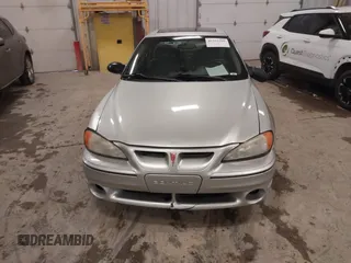 2004 Pontiac Grand Am GT with VIN 1G2NW52E04M617802, listed as a IAAI auction lot 41353209 with 103,716 mi miles. Bid and sale history available at carsss.com. Image 6.