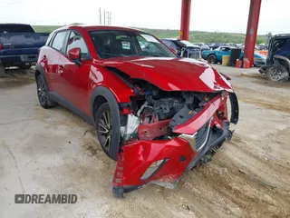 2017 Mazda CX-3 Touring z VIN JM1DKFC78H0153678, wystawiony jako IAAI lot #42446170 z przebiegiem 111 436 mil mil oraz . Historia ofert i sprzedaży dostępna na DreamBid. Obrazek 1.