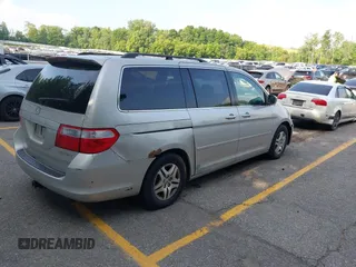 2005 Honda Odyssey EX-L with VIN 5FNRL38715B003399, listed as a IAAI auction lot 42589092 with 252,737 mi miles and . Bid and sale history available at DreamBid. Image 4.