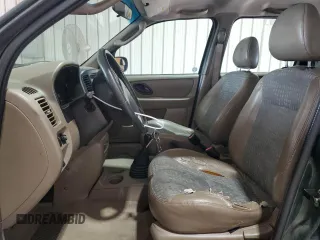 2002 Ford Escape XLS Value with VIN 1FMYU01B32KC48043, listed as a Copart auction lot 63011005 with 167,185 mi miles and Salvage title. Bid and sale history available at DreamBid. Image 7.