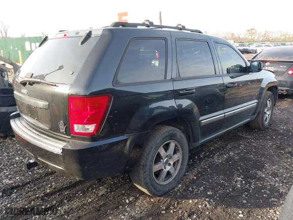 2009 Jeep Grand Cherokee Laredo with VIN 1J8GR48K29C552248, listed as a IAAI auction lot 41209184 with 194,778 mi miles. Bid and sale history available at carsss.com. Image 4.