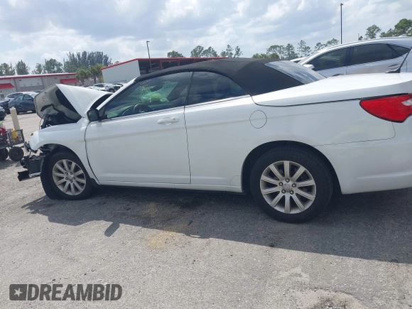 2012 Chrysler 200 Touring with VIN 1C3BCBEBXCN215502, listed as a IAAI auction lot 41913232 with Not Provided miles and . Bid and sale history available at carsss.com. Image 14.