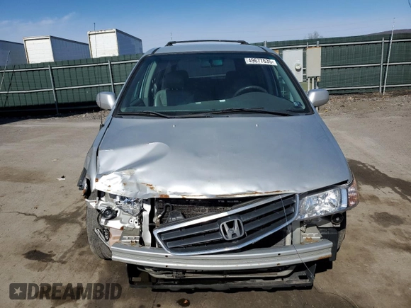 2004 Honda Odyssey EX-L with VIN 5FNRL18994B117140, listed as a Copart auction lot 49677635 with 247,237 mi miles and Salvage Title. Bid and sale history available at DreamBid. Image 5.