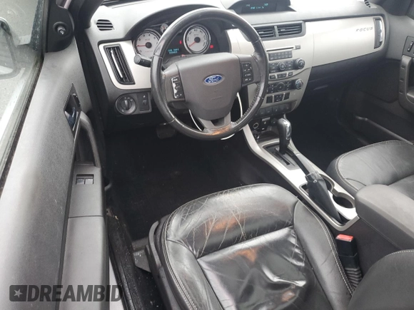 2008 Ford Focus SE z VIN 1FAHP33NX8W147139, wystawiony jako Copart lot #57520415 z przebiegiem 151 852 mil mil oraz Szkoda całkowita • Salvage title. Historia ofert i sprzedaży dostępna na DreamBid. Obrazek 8.