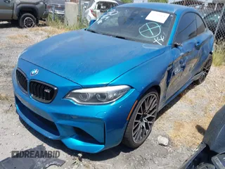 2018 BMW M2 z VIN WBS1J5C59JVE51997, wystawiony jako IAAI lot #42348421 z przebiegiem 51 376 mil mil oraz . Historia ofert i sprzedaży dostępna na DreamBid. Obrazek 2.