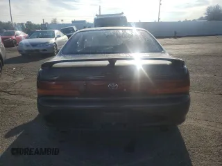 1992 Toyota Corolla z VIN AE1015132757, wystawiony jako Copart lot #70678034 z przebiegiem 152 117 mil mil oraz Szkoda całkowita • Salvage title. Historia ofert i sprzedaży dostępna na DreamBid. Obrazek 6.