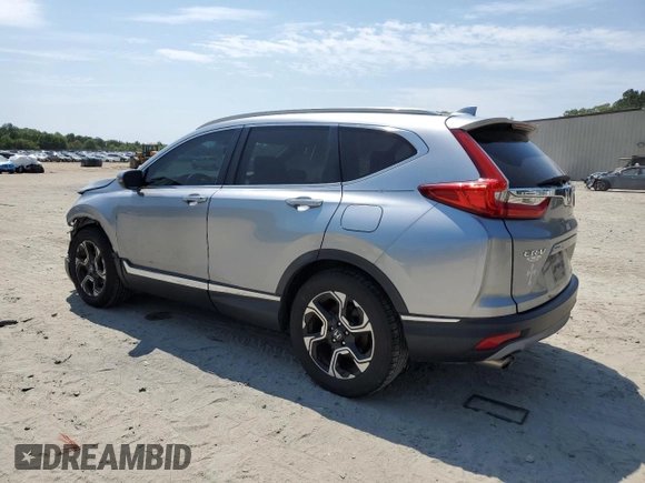 2018 Honda CR-V Touring with VIN 7FARW1H9XJE001467, listed as a Copart auction lot 55222005 with 65,611 mi miles and Salvage title. Bid and sale history available at DreamBid. Image 2.