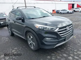 2017 Hyundai Tucson Value with VIN KM8J3CA28HU394750, listed as a IAAI auction lot 41960452 with 138,134 mi miles. Bid and sale history available at carsss.com. Image 1.