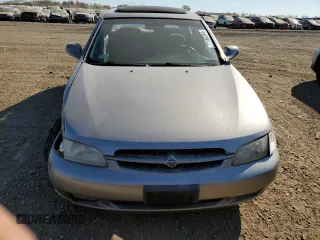 1999 Nissan Altima XE with VIN 1N4DL01D3XC245903, listed as a Copart auction lot 77186334 with 158,590 mi miles and Salvage Title. Bid and sale history available at carsss.com. Image 5.