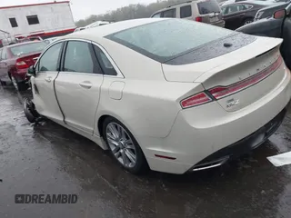2015 Lincoln MKZ z VIN 3LN6L2JK1FR603766, wystawiony jako IAAI lot #41975944 z przebiegiem 81 547 mil mil oraz . Historia ofert i sprzedaży dostępna na DreamBid. Obrazek 3.