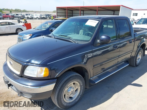 2001 Ford F-150 XLT with VIN 1FTRW08L71KA41543, listed as a IAAI auction lot 42205400 with 69,454 mi miles and . Bid and sale history available at DreamBid. Image 6.