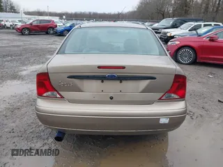 2003 Ford Focus LX with VIN 1FAFP33P33W267575, listed as a IAAI auction lot 41804406 with 106,957 mi miles and . Bid and sale history available at carsss.com. Image 16.