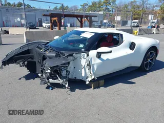 2024 Ferrari 296 GTB z VIN ZFF99SLA6R0303425, wystawiony jako IAAI lot #39193585 z przebiegiem Nie podano mil oraz . Historia ofert i sprzedaży dostępna na DreamBid. Obrazek 2.