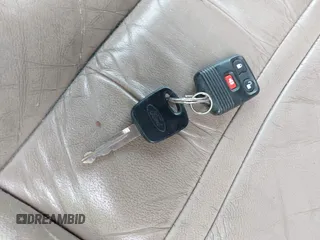 2000 Ford Excursion Limited z VIN 1FMNU42S0YEC70159, wystawiony jako IAAI lot #40918396 z przebiegiem 168 564 mil mil oraz . Historia ofert i sprzedaży dostępna na DreamBid. Obrazek 11.