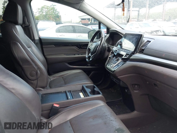 2019 Honda Odyssey Elite with VIN 5FNRL6H93KB077180, listed as a IAAI auction lot 41936408 with 75,168 mi miles and . Bid and sale history available at DreamBid. Image 5.