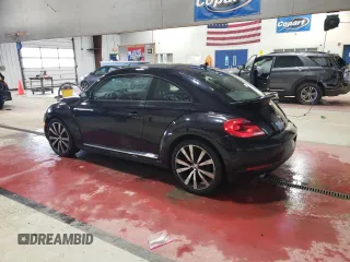 2012 Volkswagen Beetle Turbo with VIN 3VWVA7AT4CM665261, listed as a Copart auction lot 50562025 with 62,570 mi miles and Salvage Title. Bid and sale history available at DreamBid. Image 2.