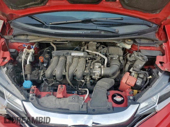 2018 Honda Fit EX-L with VIN 3HGGK5H97JM706911, listed as a Copart auction lot 57121595 with 117,375 mi miles and Salvage title. Bid and sale history available at DreamBid. Image 11.