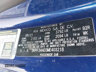2021 Kia Forte GT-Line with VIN 3KPF34AD3ME403218, listed as a IAAI auction lot 42375319 with 56,621 mi miles and . Bid and sale history available at DreamBid. Image 9.