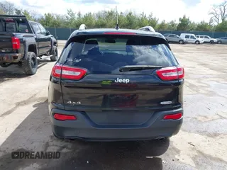 2014 Jeep Cherokee Latitude with VIN 1C4PJMCS6EW219999, listed as a IAAI auction lot 42044695 with 169,533 mi miles and . Bid and sale history available at carsss.com. Image 17.