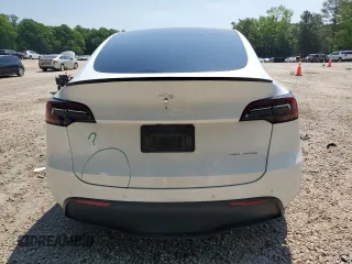 2022 Tesla Model Y Long Range z VIN 7SAYGDEE1NF354633, wystawiony jako Copart lot #55221835 z przebiegiem 53 821 mil mil oraz Szkoda całkowita • Salvage title. Historia ofert i sprzedaży dostępna na DreamBid. Obrazek 6.