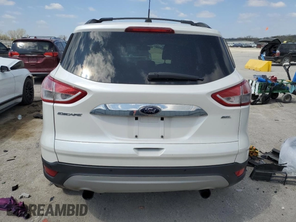 2013 Ford Escape SEL with VIN 1FMCU9H9XDUB08144, listed as a Copart auction lot 52887545 with 142,451 mi miles and Salvage Title. Bid and sale history available at DreamBid. Image 6.