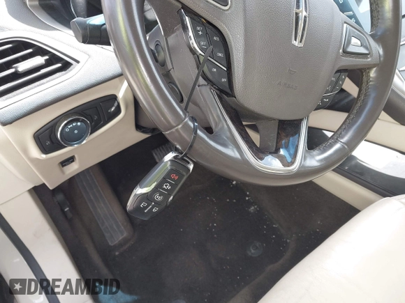 2015 Lincoln MKZ with VIN 3LN6L2G94FR602163, listed as a IAAI auction lot 41889160 with 89,909 mi miles and . Bid and sale history available at DreamBid. Image 11.
