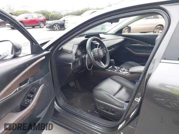 2022 Mazda CX-30 S Premium with VIN 3MVDMBDL9NM434619, listed as a IAAI auction lot 41620655 with 46,557 mi miles and . Bid and sale history available at carsss.com. Image 5.