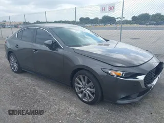 2021 Mazda 3 Select with VIN 3MZBPABL5MM252201, listed as a IAAI auction lot 42029577 with Not Provided miles and . Bid and sale history available at DreamBid. Image 1.