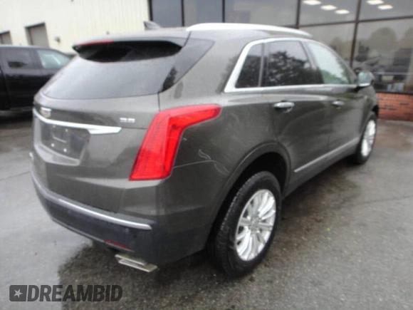2019 Cadillac XT5 AWD z VIN 1GYKNBRS6KZ1997XX, wystawiony jako Copart lot #60343895 z przebiegiem 22 500 mil mil oraz Czysty tytuł • Clean title. Historia ofert i sprzedaży dostępna na DreamBid. Obrazek 4.