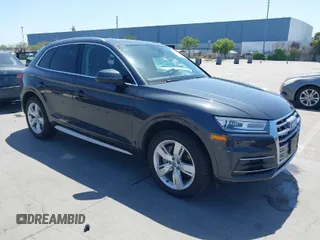 2019 Audi Q5 Premium with VIN WA1ANAFY2K2040638, listed as a IAAI auction lot 42095555 with 98,990 mi miles. Bid and sale history available at carsss.com. Image 1.